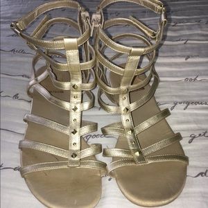Gold ankle high sandals